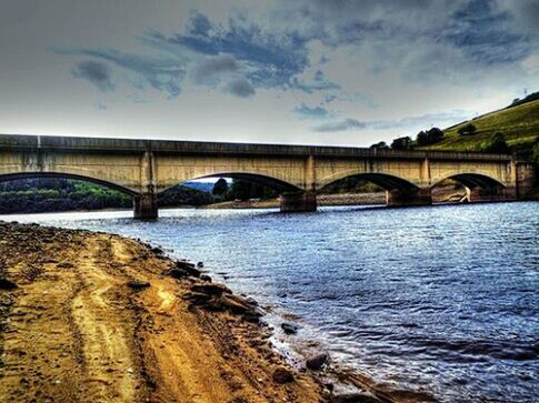 BRIDGE OVER RIVER WITH BRIDGE IN BACKGROUND