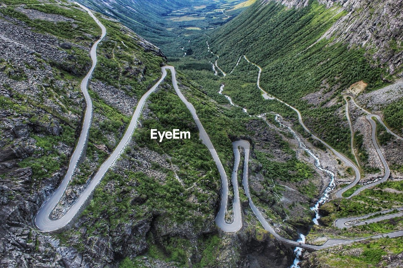 High angle view of winding road by river