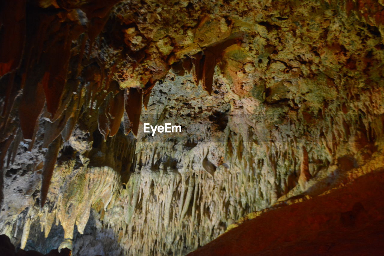 LOW ANGLE VIEW OF ROCK FORMATION