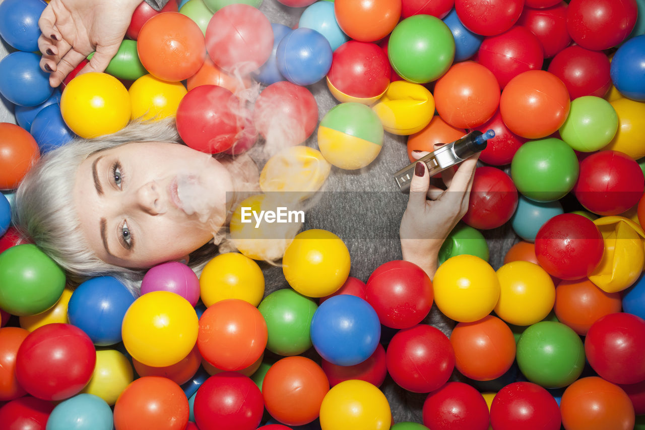 Young woman in a ball pit