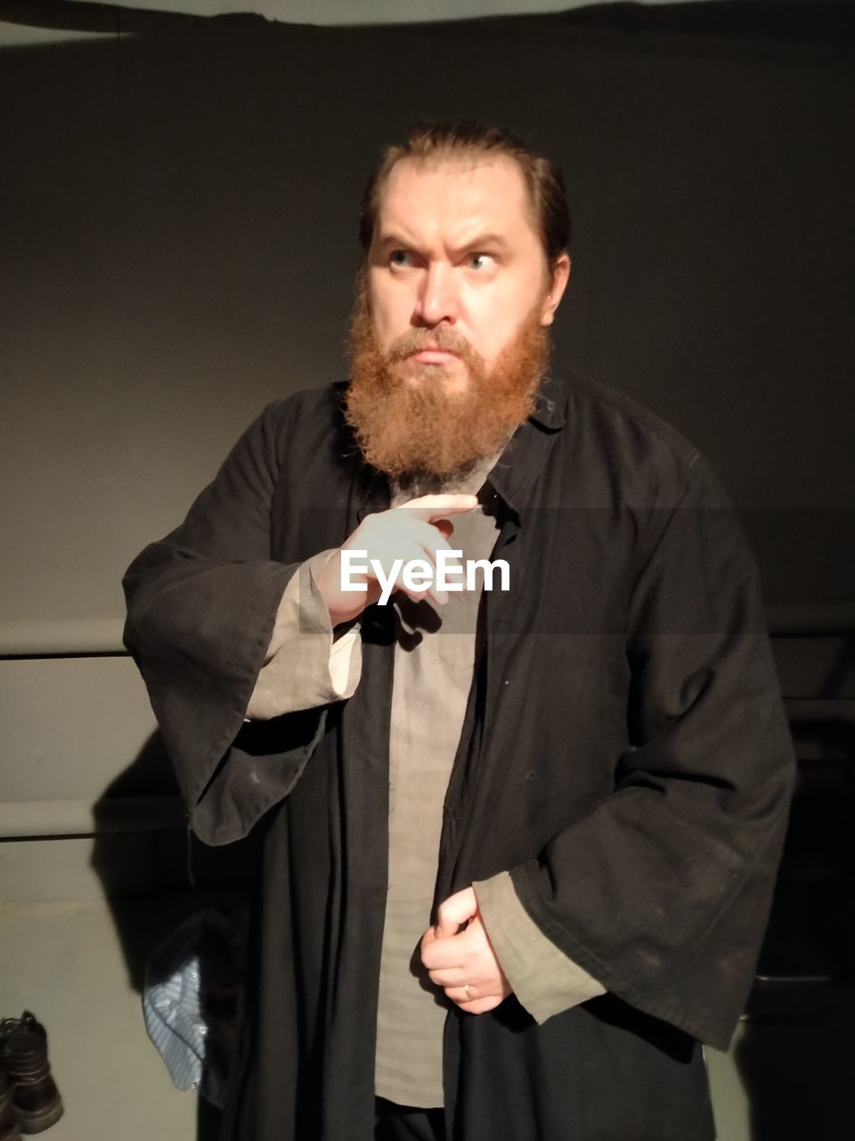 beard, one person, adult, facial hair, men, indoors, portrait, standing, waist up, looking at camera, clothing, person, business, front view, serious, mature adult, emotion, lifestyles, arts culture and entertainment, brown hair, looking, jacket