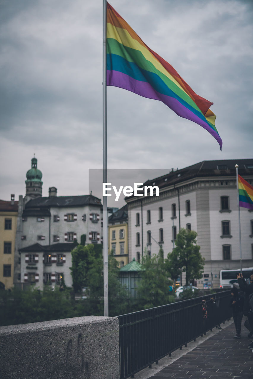 RAINBOW OVER BUILDINGS IN CITY