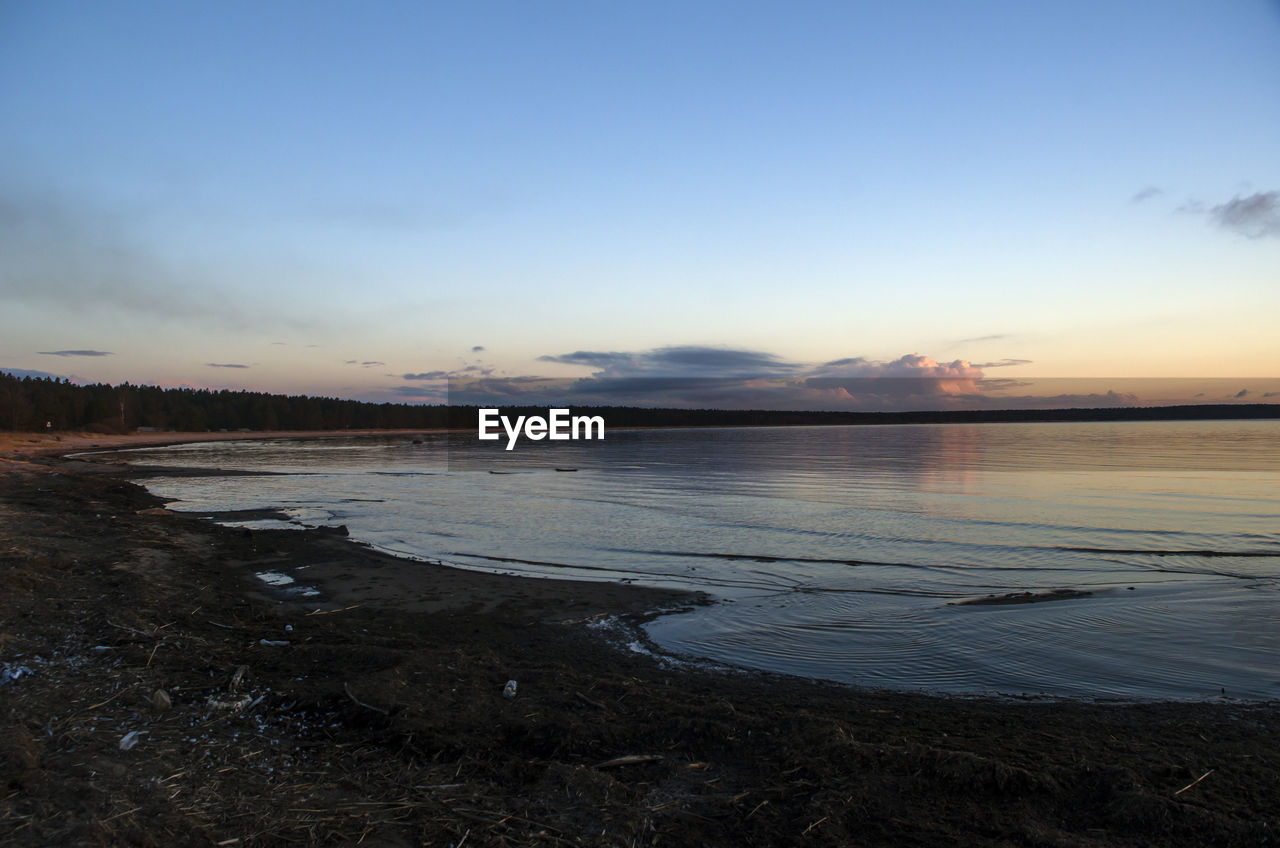 Scenic view of sea against sky during sunset