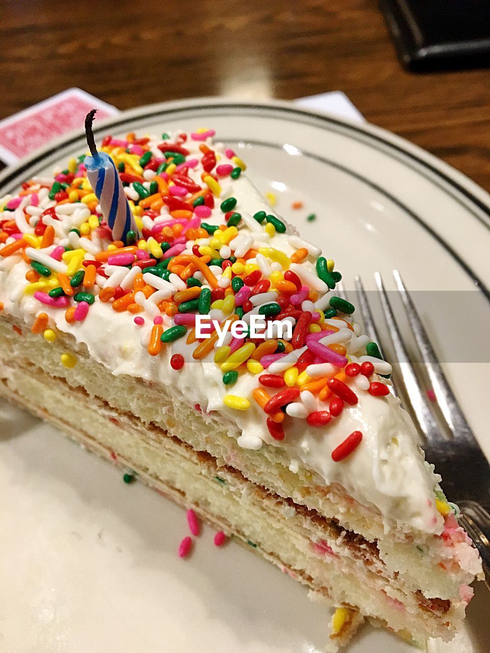 CLOSE-UP OF MULTI COLORED CAKE