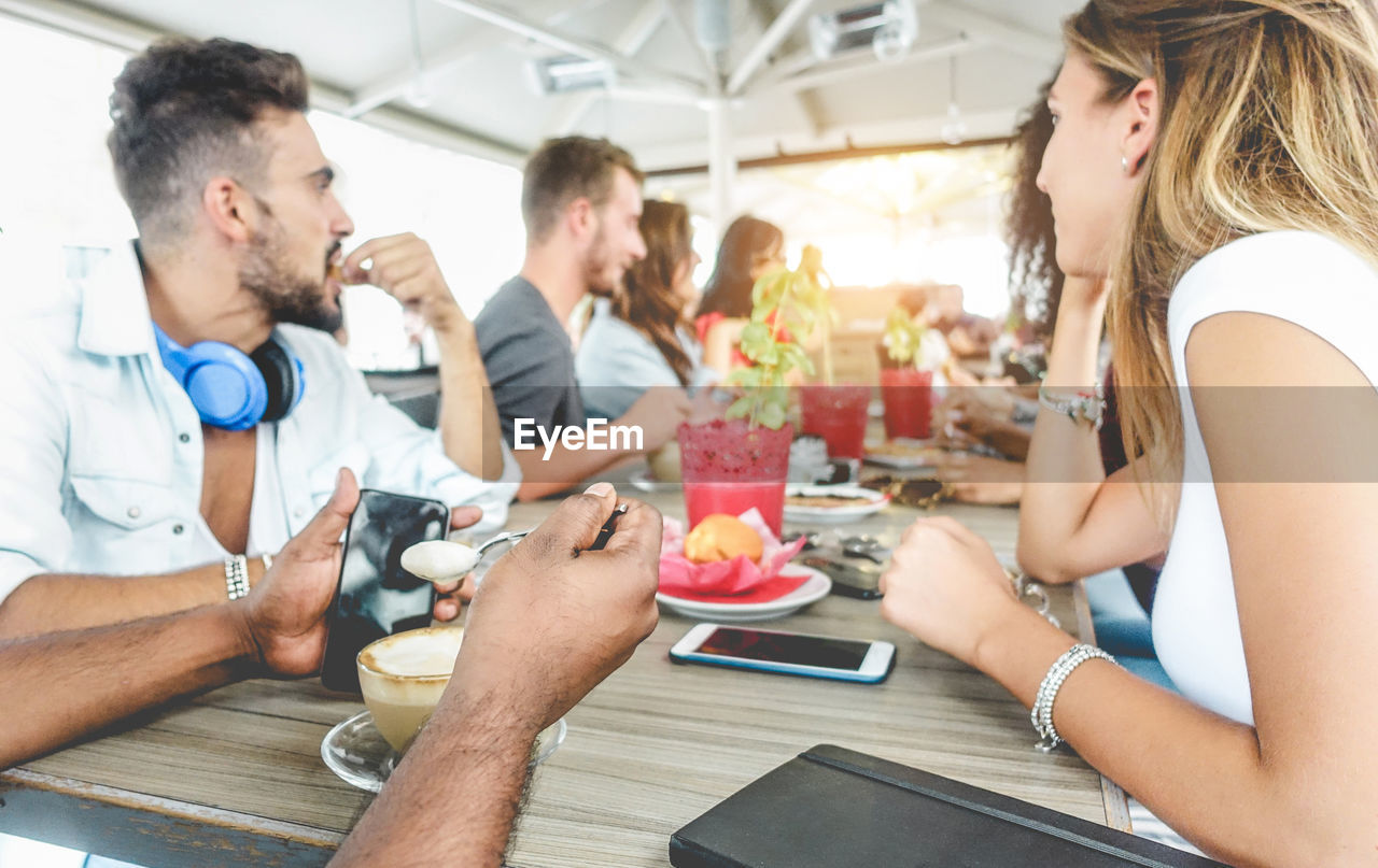 People sitting on table at restaurant