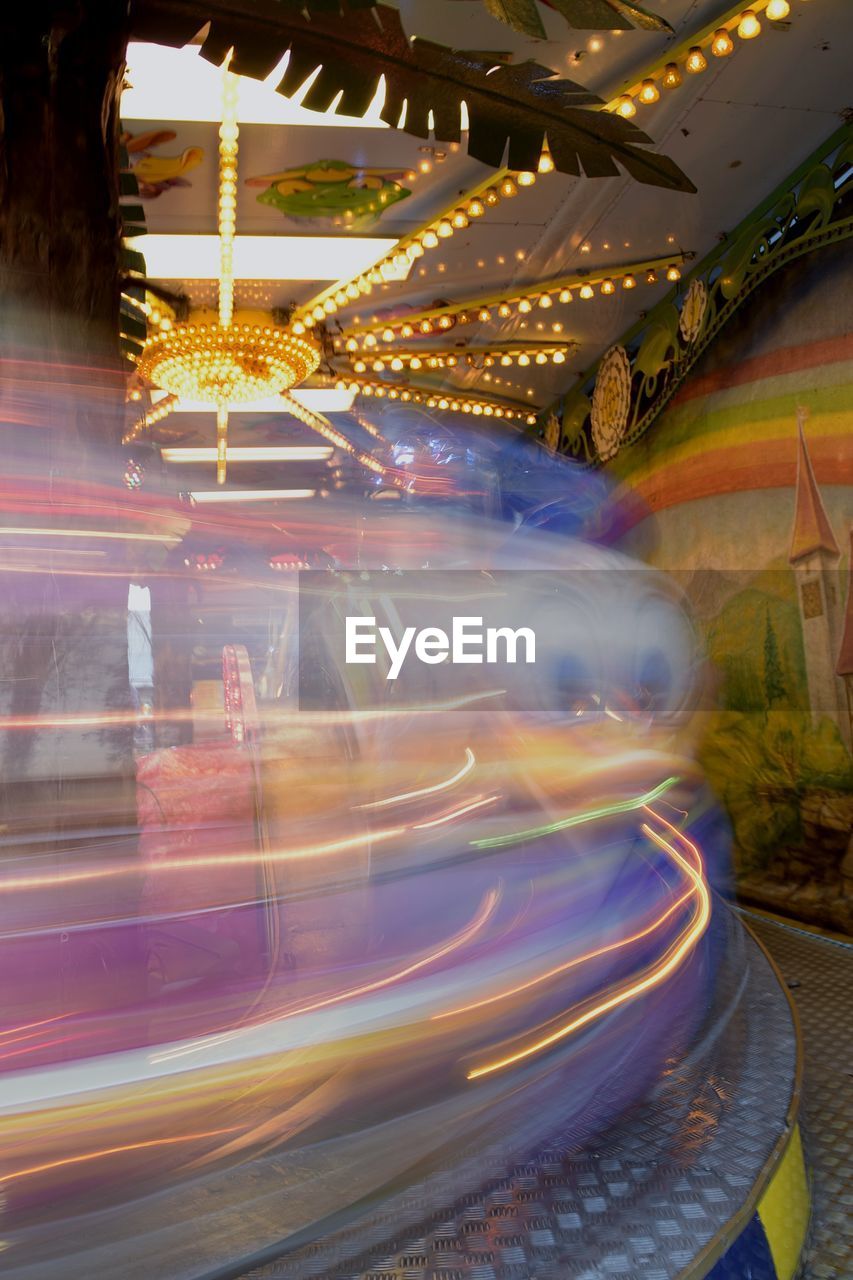 LIGHT TRAILS IN AMUSEMENT PARK