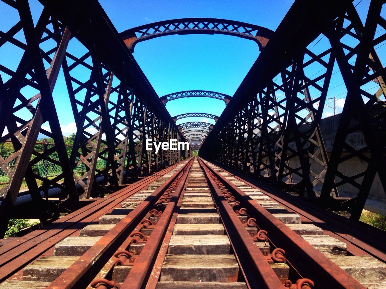 Railroad tracks against clear sky