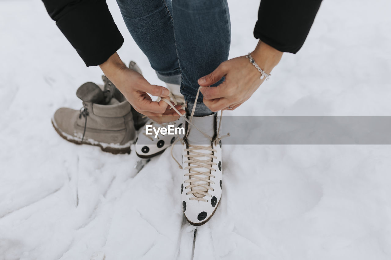 Person tying ice-skates