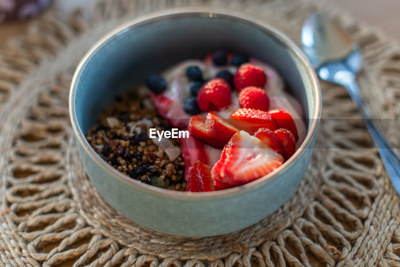 Fresh fruits and muesli with yogurt for healthy breakfast 