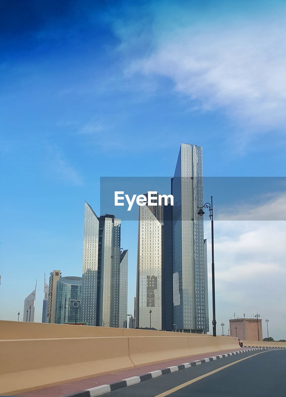 Modern buildings against blue sky