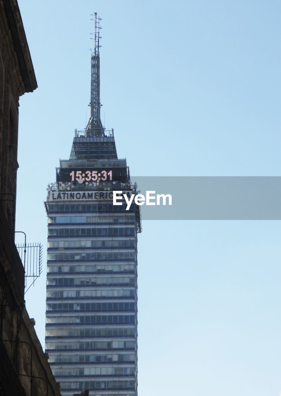 LOW ANGLE VIEW OF BUILDINGS AGAINST CLEAR SKY