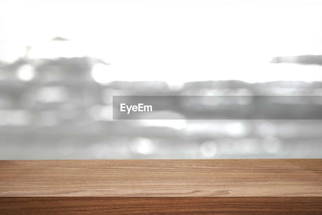 CLOSE-UP OF WOOD AGAINST SKY