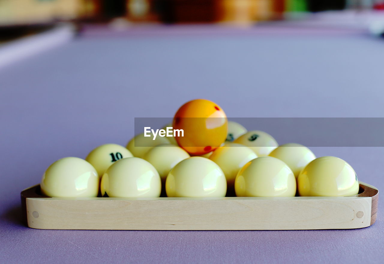 Close-up of pool balls on table