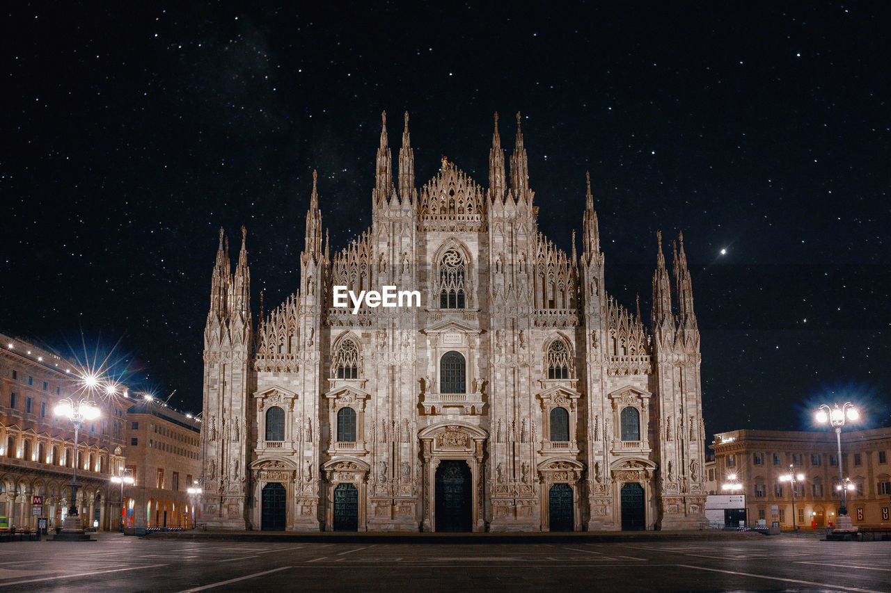 Facade of cathedral against star field
