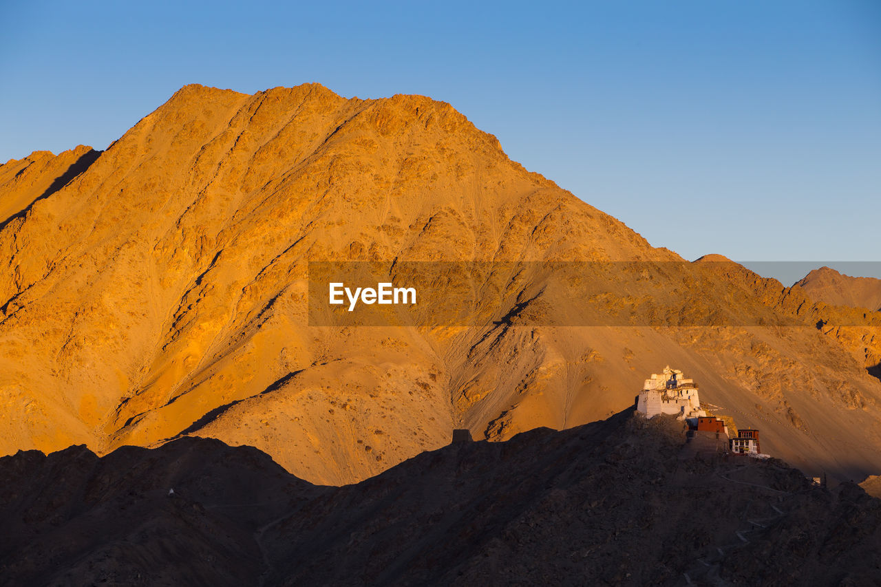 Scenic view of mountains against clear sky