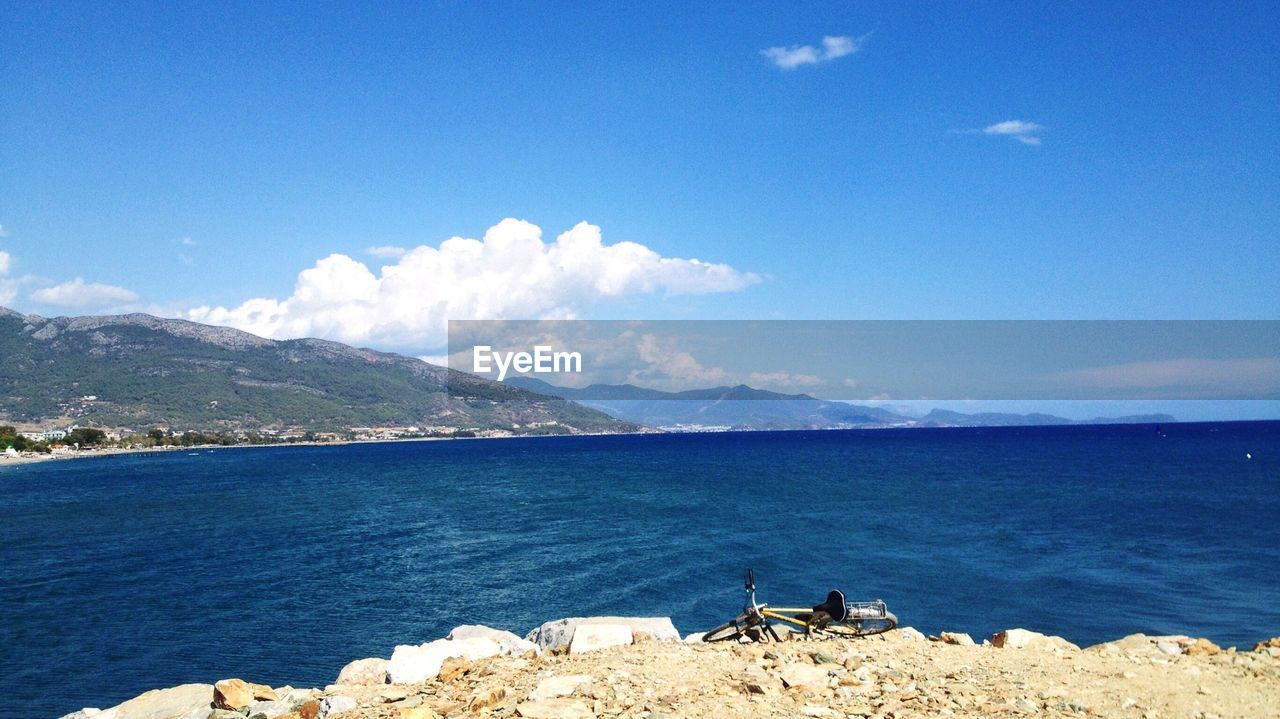 Scenic view of sea against cloudy sky