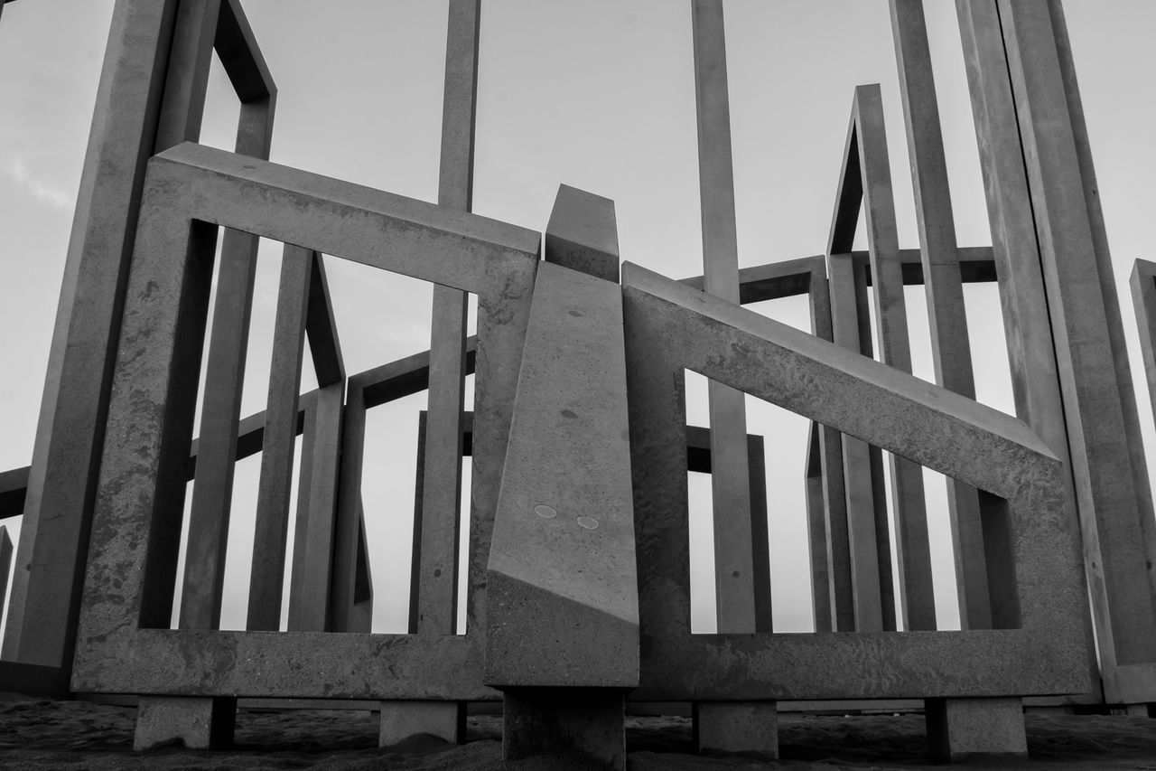 LOW ANGLE VIEW OF METAL STRUCTURE AGAINST SKY