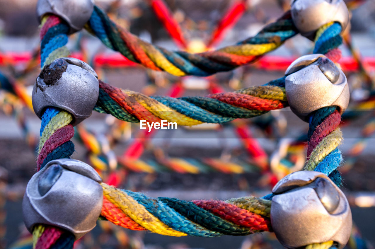 Close-up of colorful rope equipment at playground