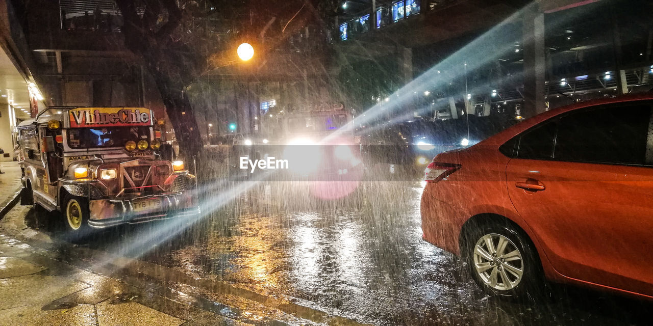 WET STREET IN CITY DURING RAINY SEASON