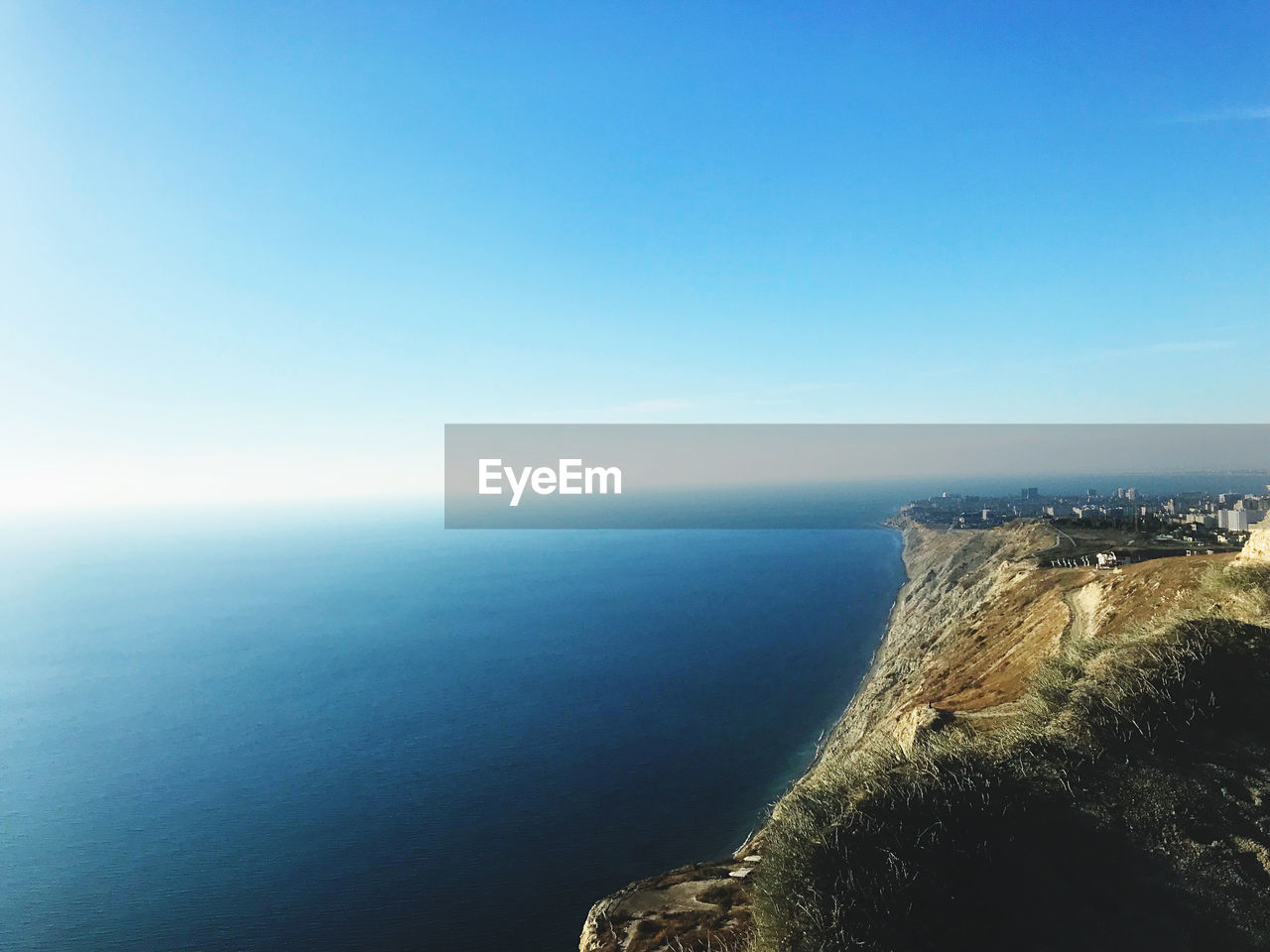 SCENIC VIEW OF SEA AGAINST BLUE SKY