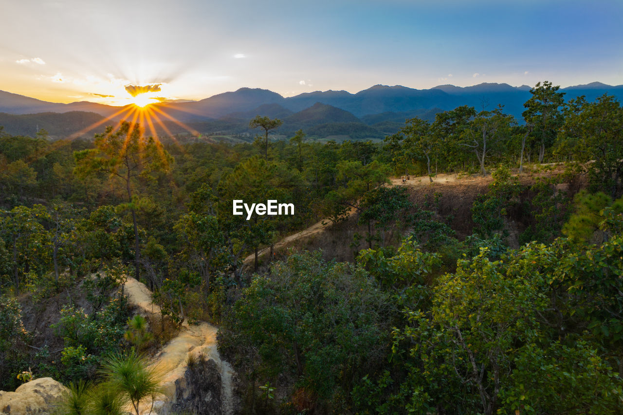 Scenic view of mountains against sky during sunset