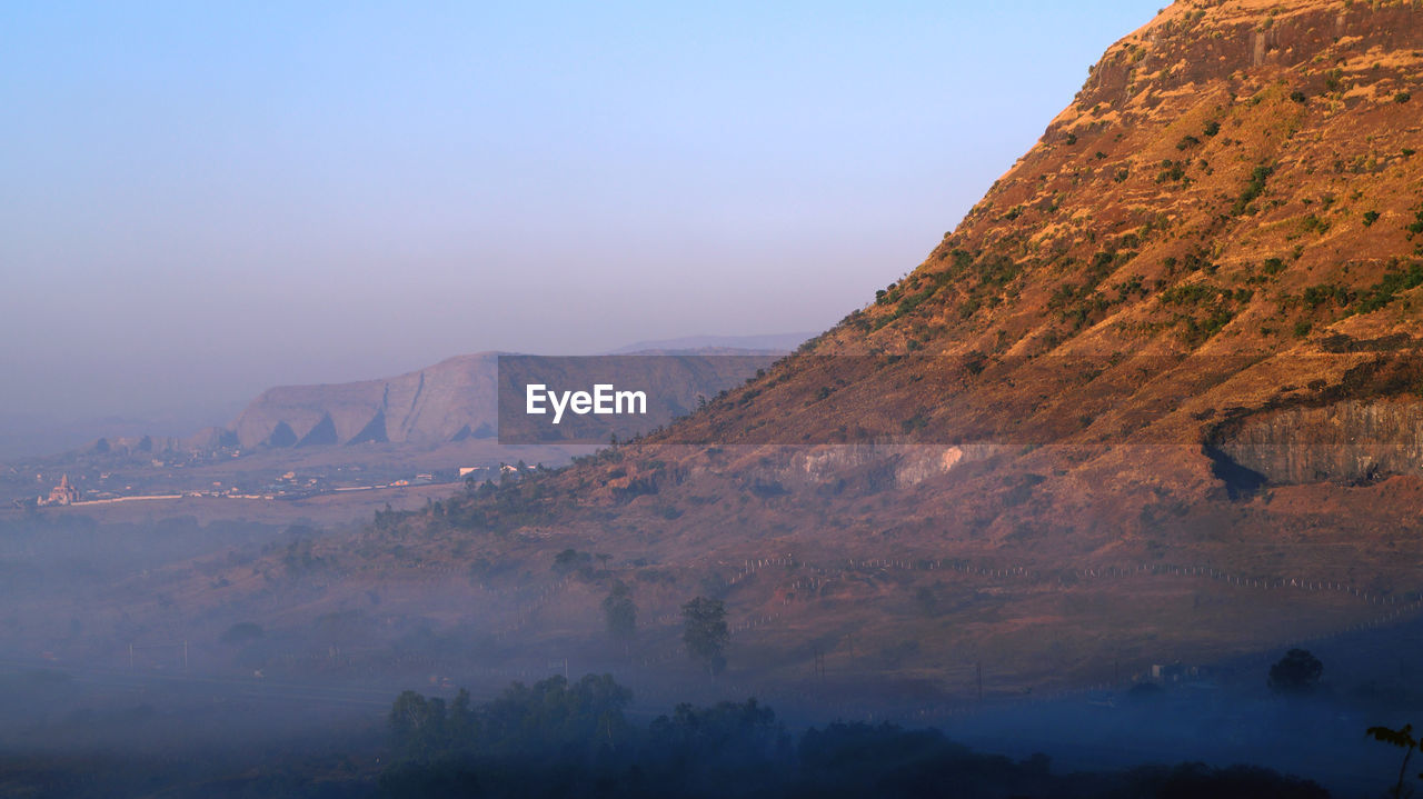 Scenic view of mountains against sky