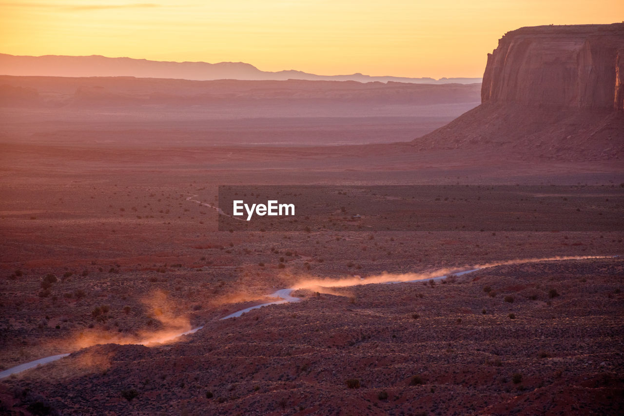 scenic view of landscape at sunset