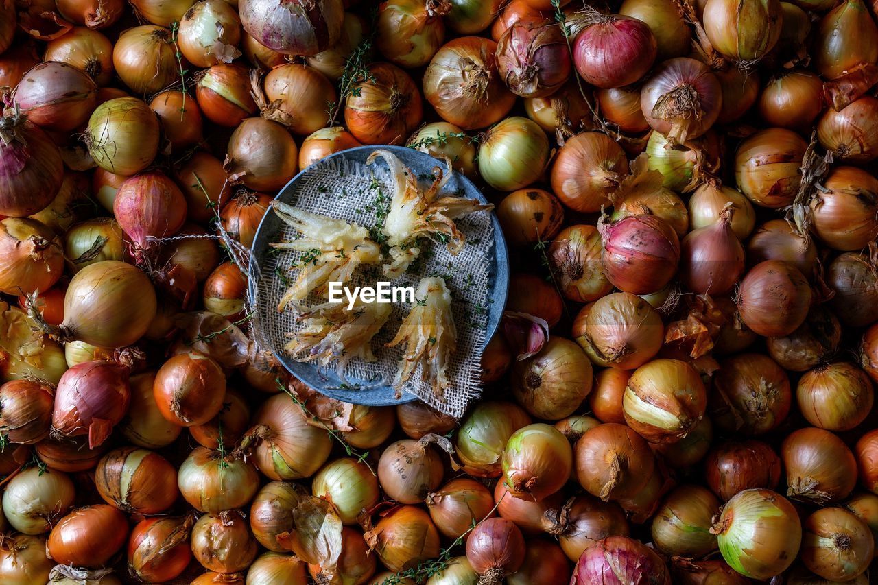 Full frame shot of onions for sale at market stall