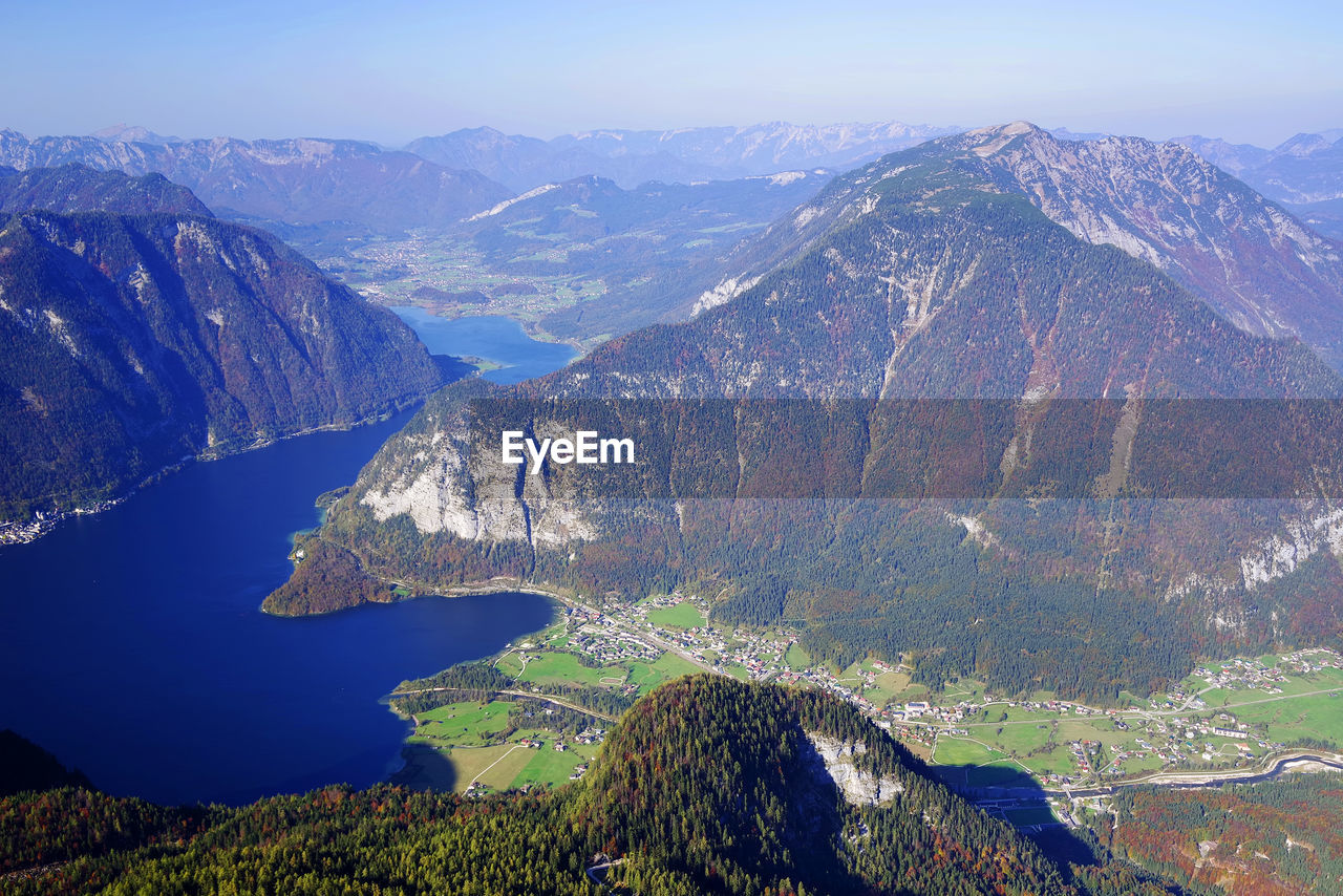 Aerial view of landscape with mountain range in the background