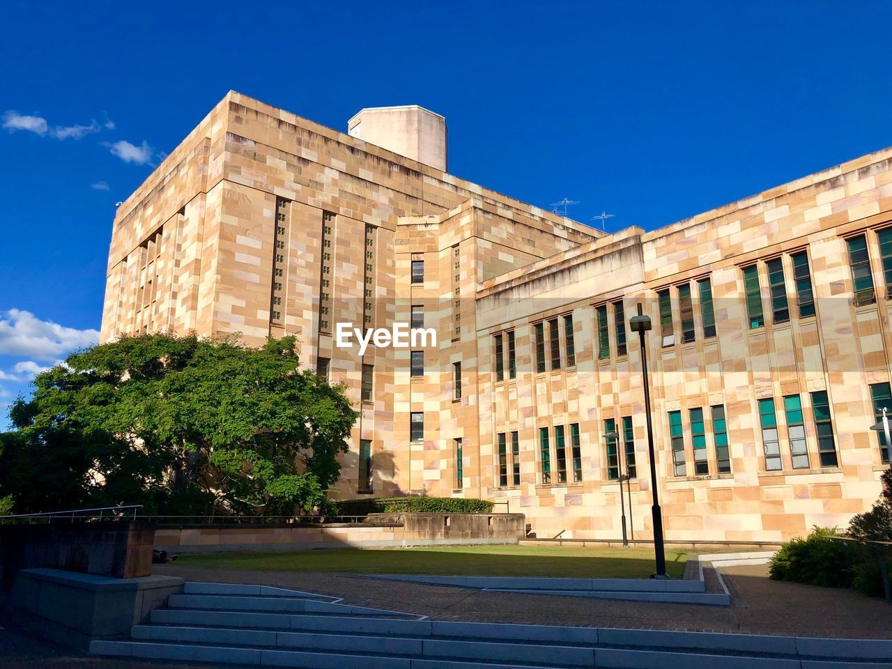 Low angle view of historical building against blue sky