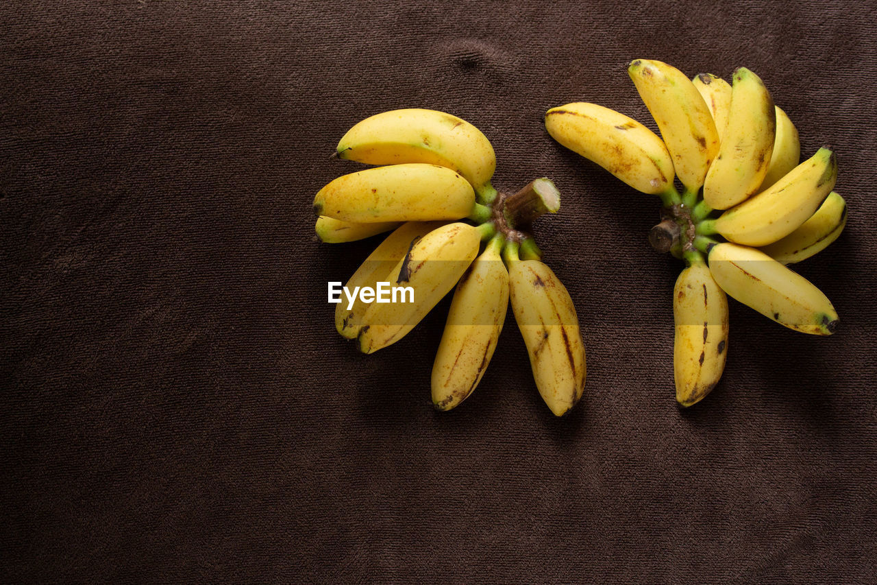 HIGH ANGLE VIEW OF FRUITS AND BLACK BACKGROUND