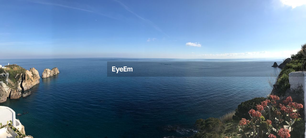 SCENIC VIEW OF SEA AGAINST BLUE SKY