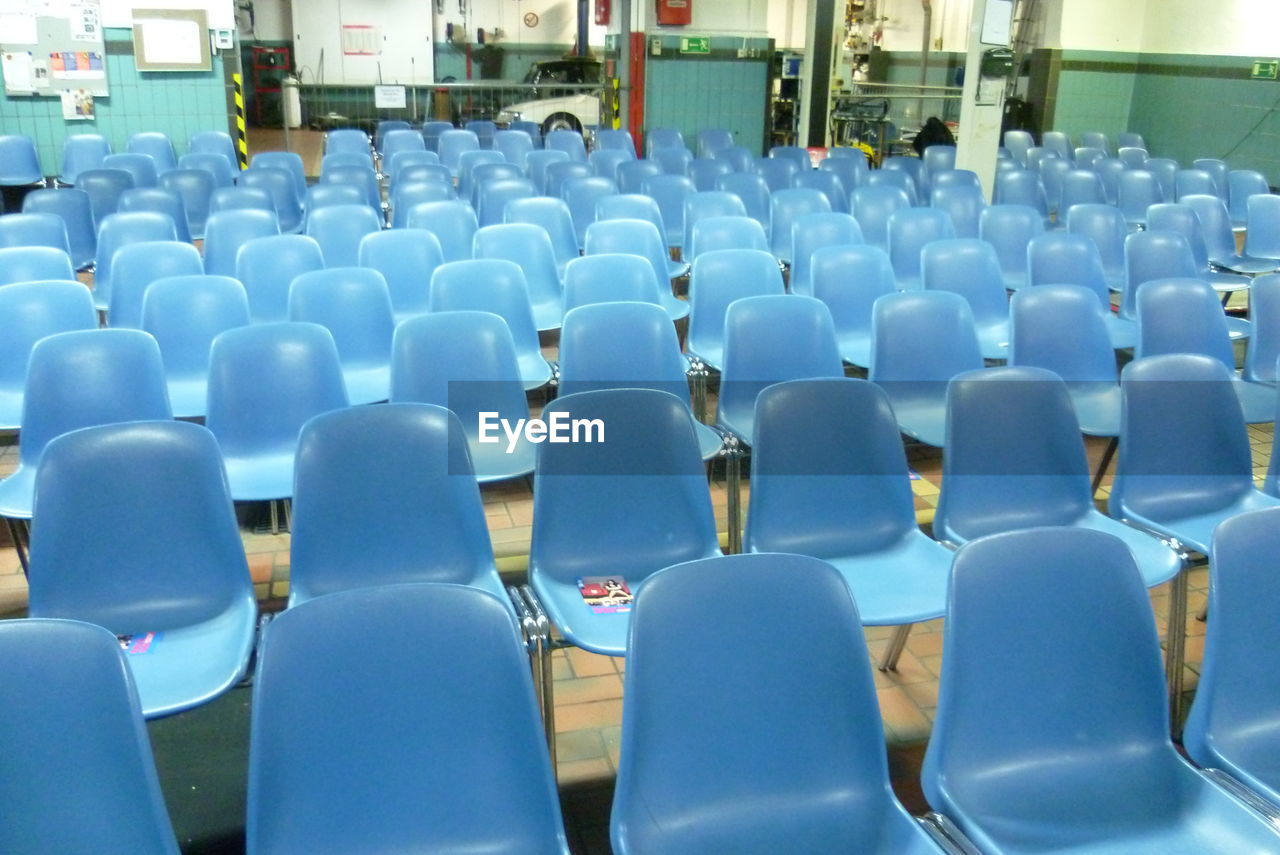 Large group of blue chairs indoor