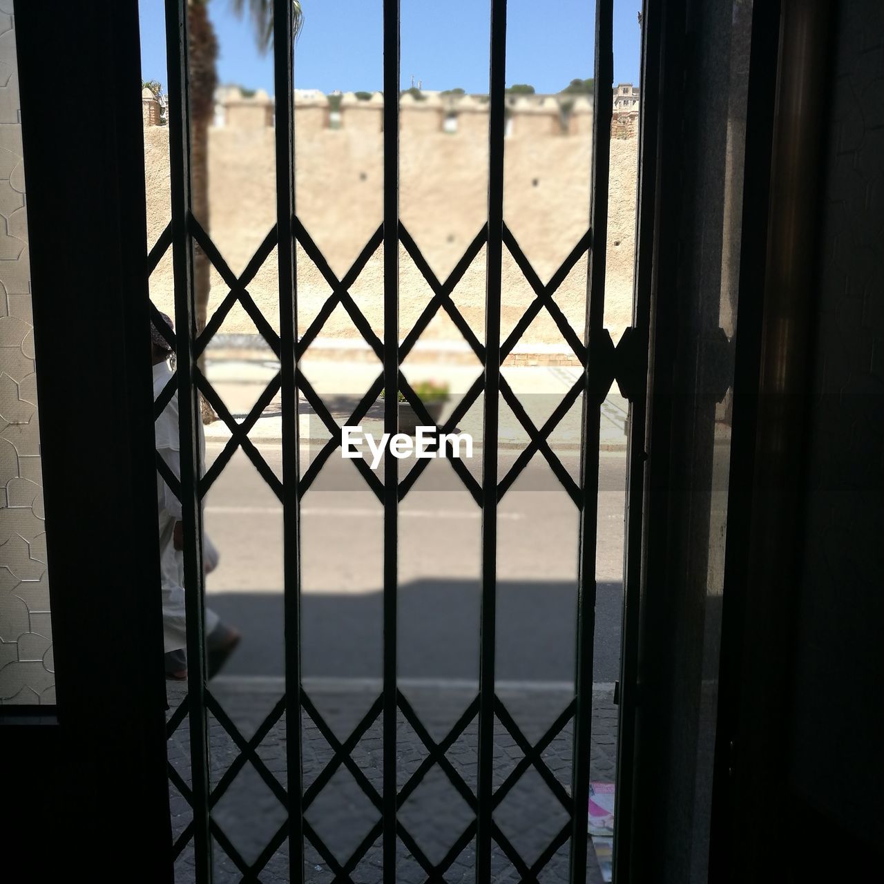 SCENIC VIEW OF SEA SEEN THROUGH WINDOW