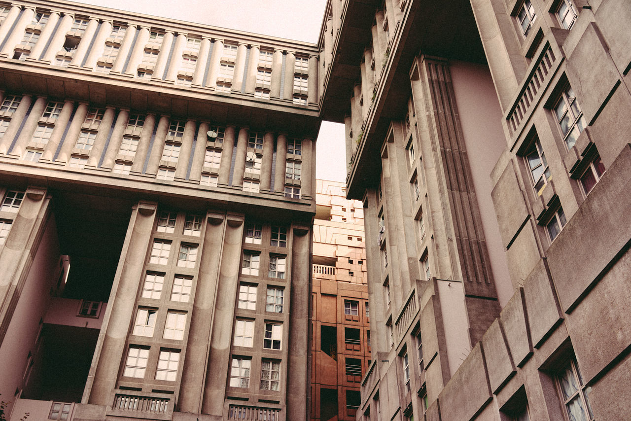 LOW ANGLE VIEW OF RESIDENTIAL BUILDING