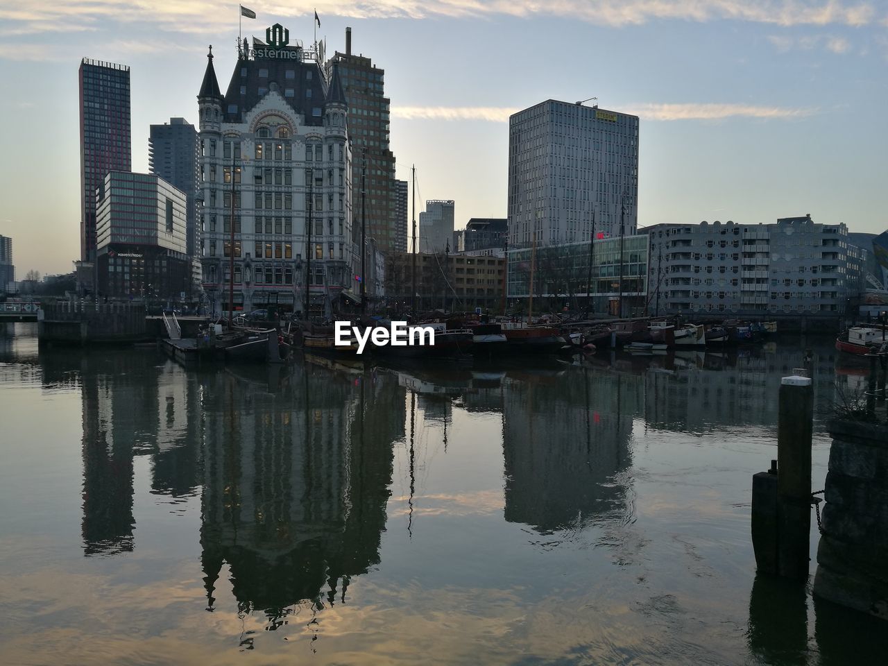 REFLECTION OF SKYSCRAPERS IN WATER