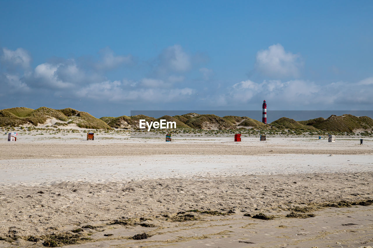 GROUP OF PEOPLE ON BEACH