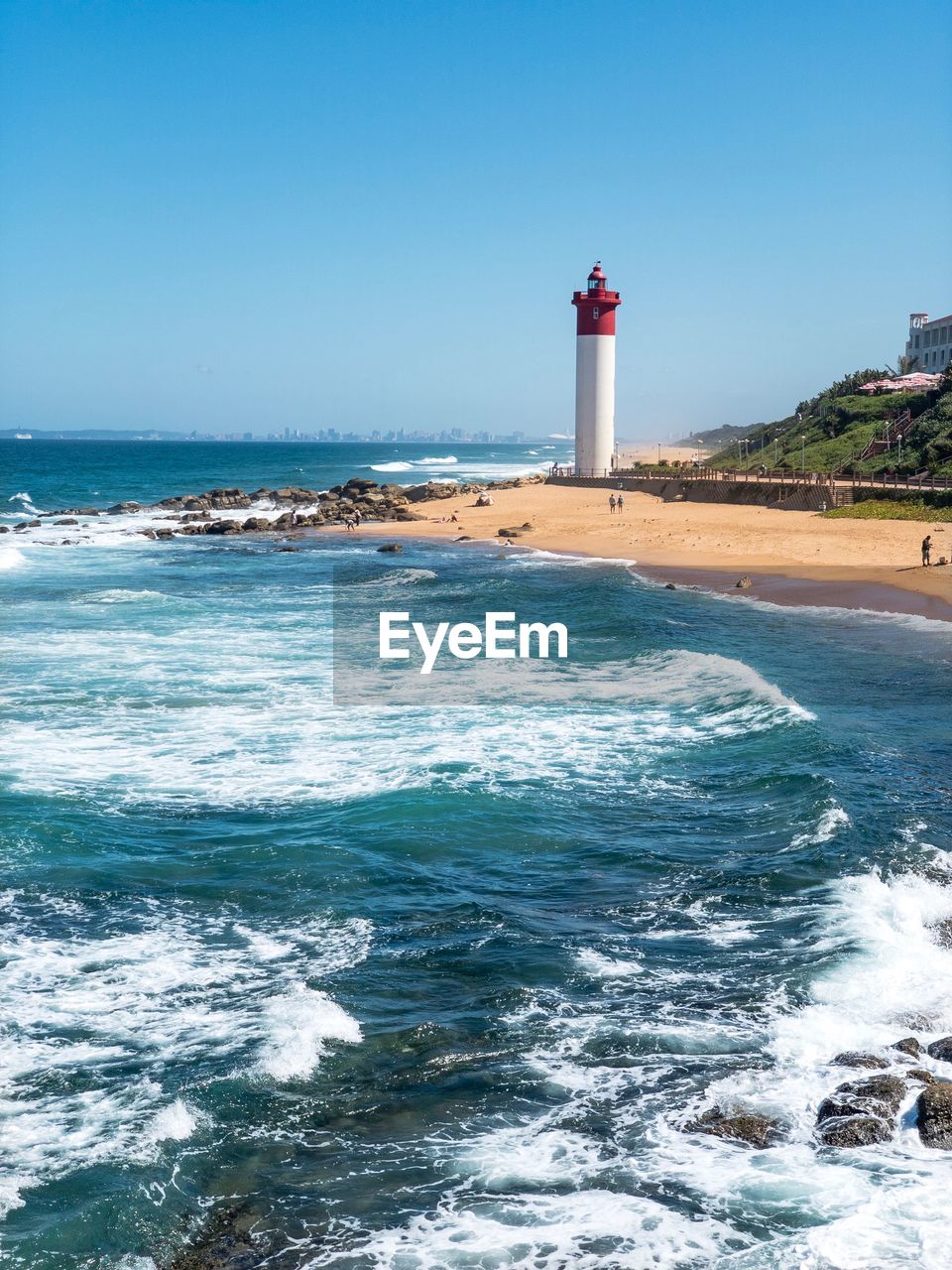 Durban south africa lighthouse by sea against clear blue sky