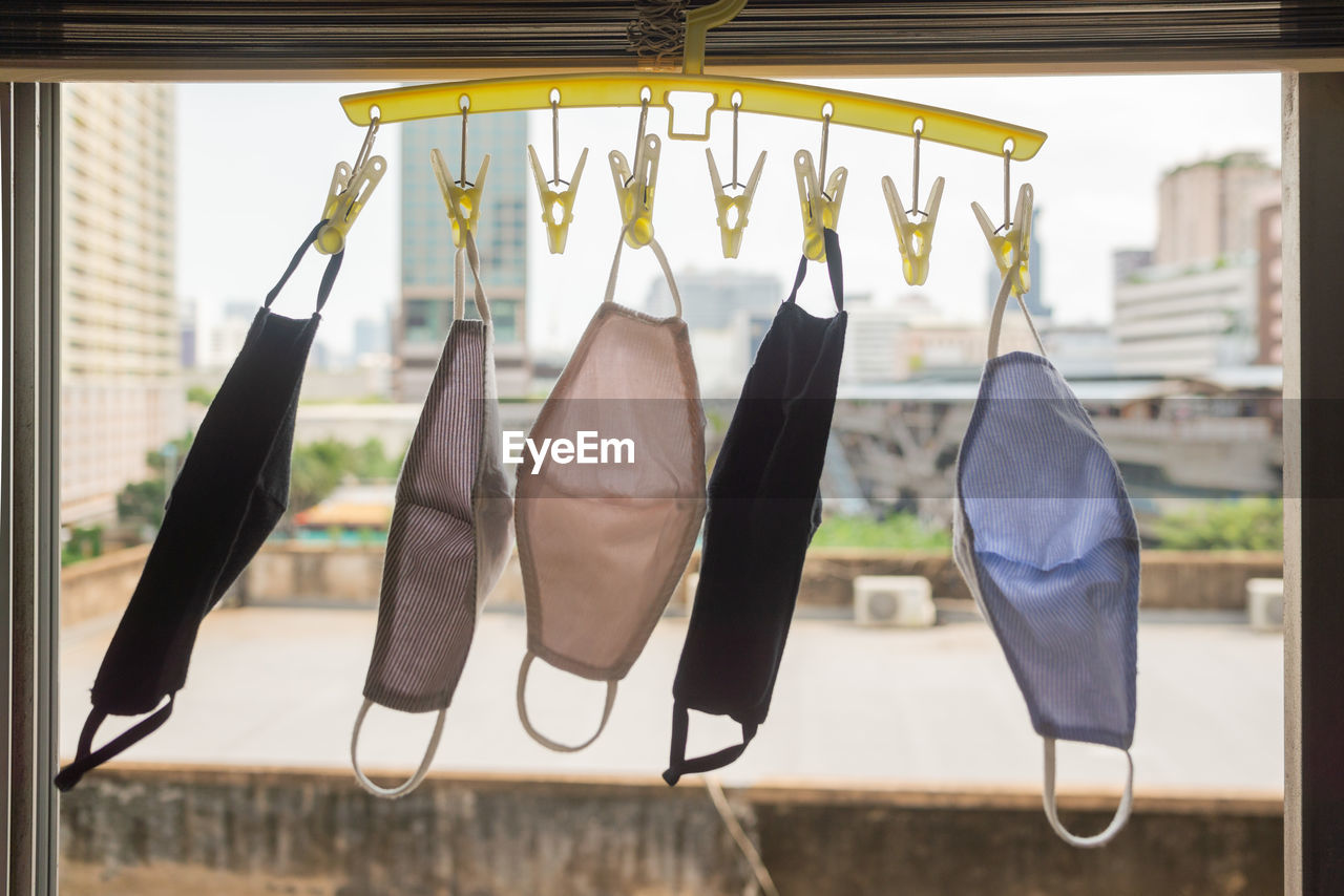 Hang dry the conton masks on the window. cotton mask is a necessity in daily life.