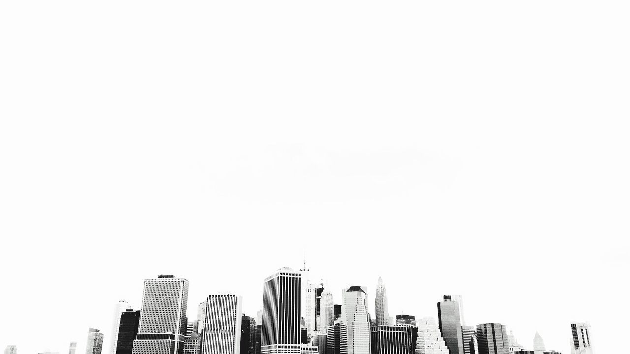HIGH SECTION OF MODERN BUILDINGS AGAINST SKY