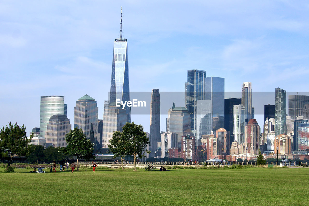 The manhattan skyline in the afternoon as viewed from across the hudson river, liberty state park.