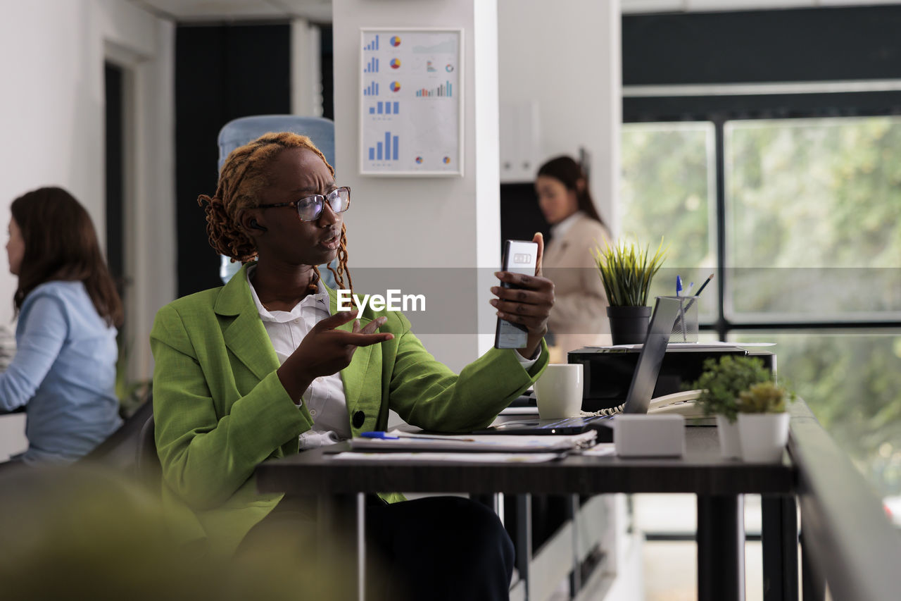 business colleagues working at table