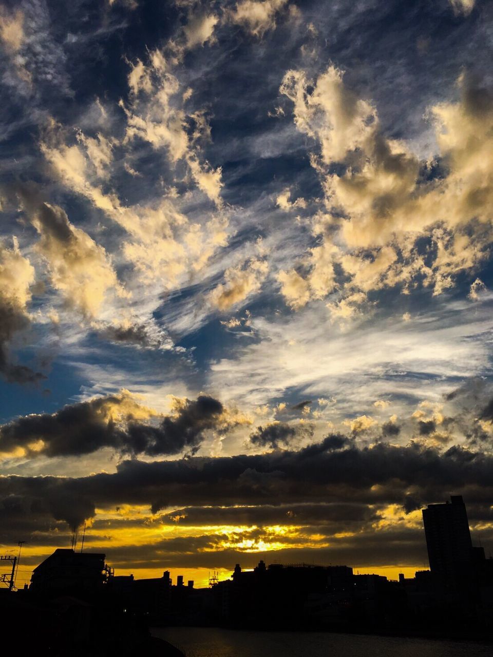 SCENIC VIEW OF DRAMATIC SKY OVER SILHOUETTE LANDSCAPE