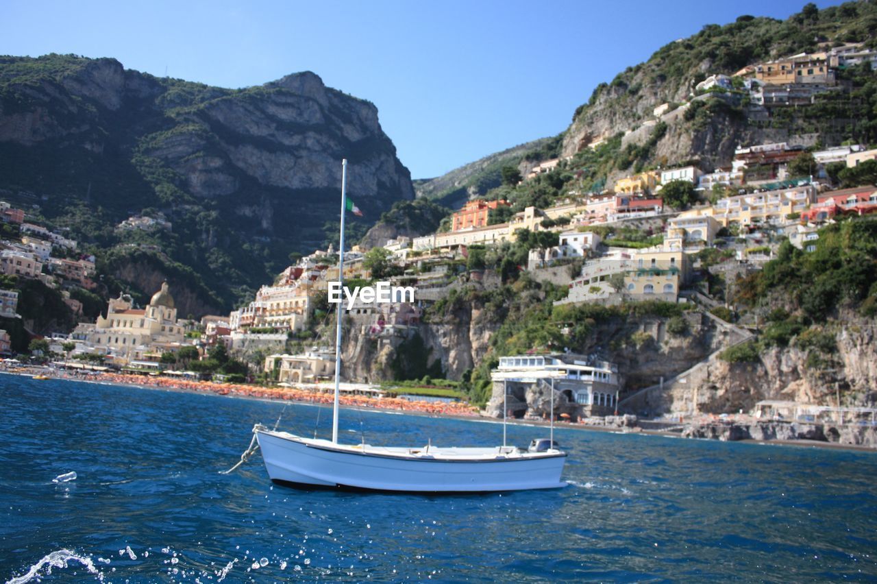 VIEW OF BOATS IN SEA