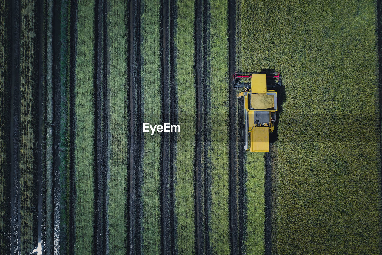 High angle view of agricultural machinery on field