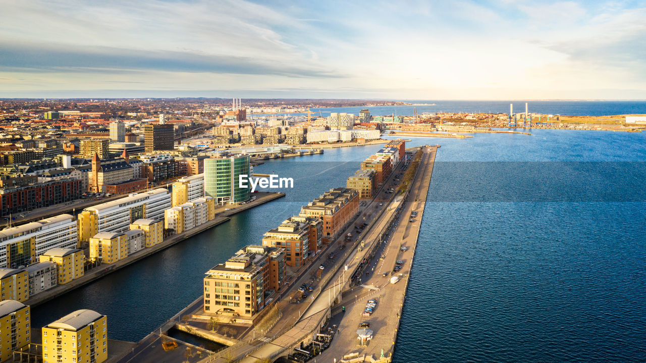 High angle view of river amidst buildings in city