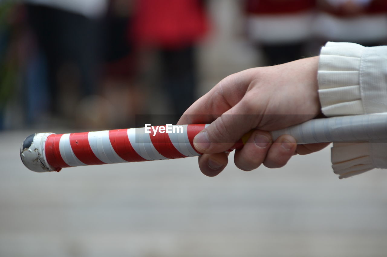 Close-up of hand holding decoration