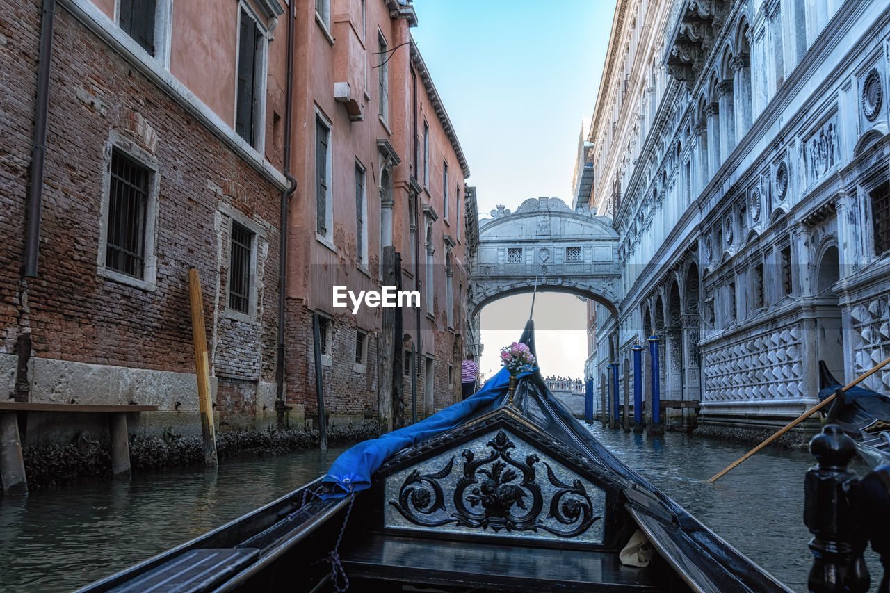 The view of the canal water and the famous bridge of sighs from a gondola ride. venice, italy
