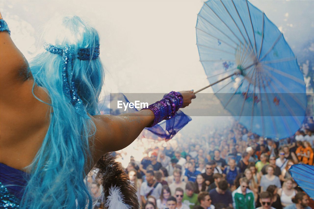 PEOPLE ENJOYING IN AMUSEMENT PARK