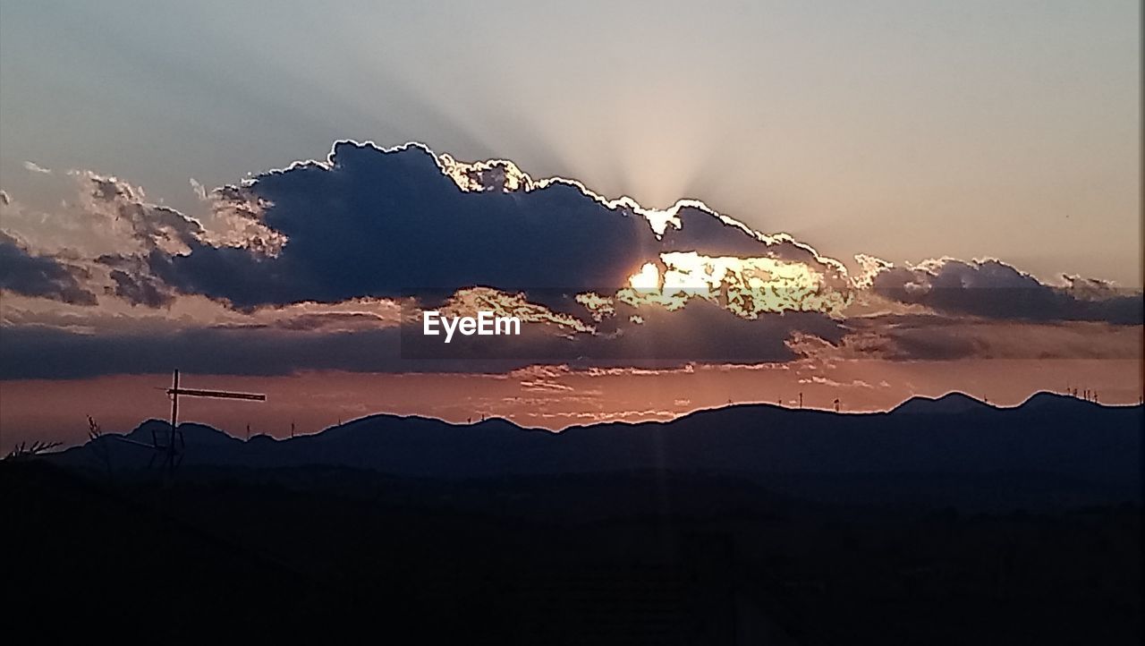 SILHOUETTE LANDSCAPE AGAINST SKY DURING SUNSET
